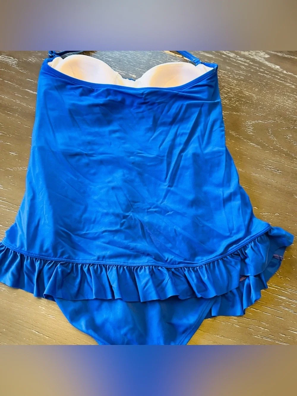 Beautiful blue one piece swimsuit.  Size 10. Very classy and cute!